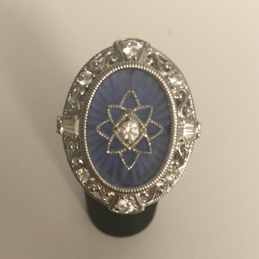 Art Deco style ring in sterling silver. Translucent blue stone/zircon size 10